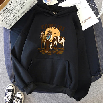 The Cowgirl And Her Cow And Horse Live In The West Hoodie